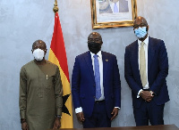 Ebenezer Asante,  Ralph Mupita  pose with Mahamudu Bawumia