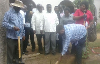 William Amanfu cutting the sod for commencement of the project