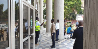 People were screened before they are allowed to enter the Accra City Hall