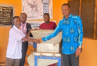 Amansie South DCE donating a gari processing machine and soap-making machine