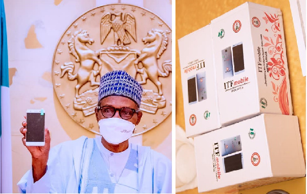 Buhari receives a copy of Nigeria's first locally manufactured smartphone in Abuja