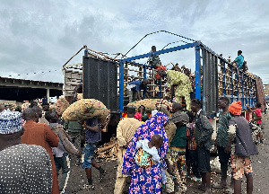 Sacks Of Onions Being Offloaded From A Vehicle From Niger At The Adjen Kotoku Market In Accra Kent M