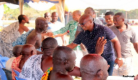 Mr. Paul Asare Ansah exchanges pleasantries with the chiefs of Asuogyaman