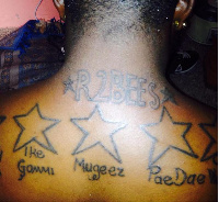 Fan tatoo's R2bee's name on his neck