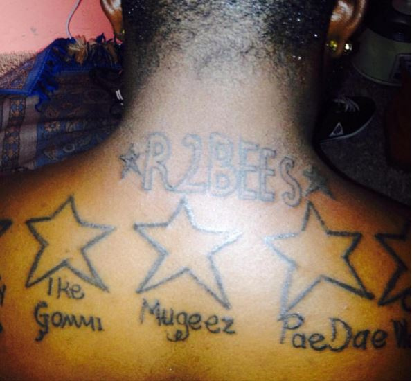 Fan tatoo's R2bee's name on his neck