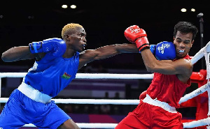 Joseph Commey in blue