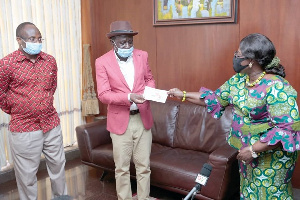 Chief of Staff, Akosua Frema Osei-Opare [R] receiving the items