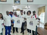 Members of NPP South Africa presenting the shirts