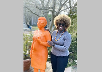 Danielle Twum with her statue