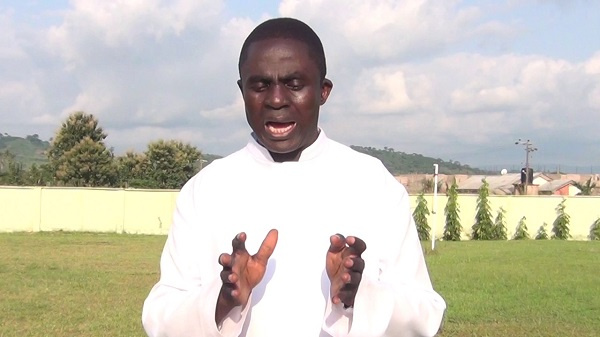 Reverend Father Isaac Benuyenah, Parish Priest of the St Augustine Roman Catholic Church