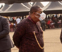 Archbishop Nicholas Duncan-Williams wearing double nose masks