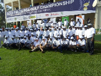 Golfers and organizers in a group photograph doing the opening ceremony