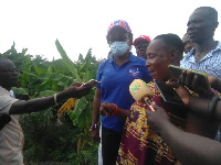 Cynthia Mamle Morrison cut sod for construction bridges over River Akora