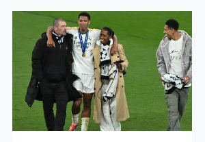 Jude Bellingham with his family after securing a win against Dortmund