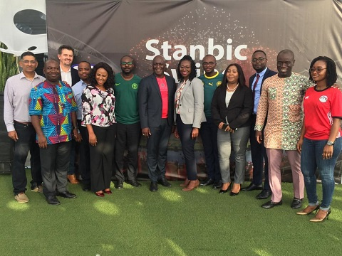 Some staff of Stanbic Bank in a group photo after the programme