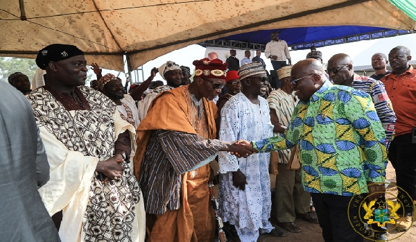 President Akufo-Addo shaking hands with the chief of Ngleshie Amanfro