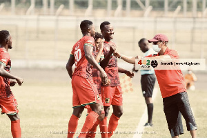 Asante Kotoko coach, Mariano Barreto and his players