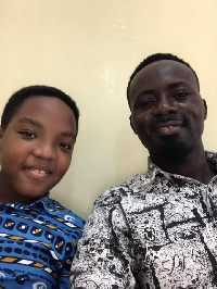 The nine-year-old Oswald with the senior Oswald Okaitei, organiser of Ghana Reads!