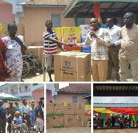 Members of PWDs receiving items from the Kwahu East District Assembly