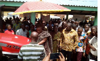 Minister presenting the tractors and other equipment to the people of Abetifi