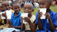 Pupils in Bugesera District drink milk at school