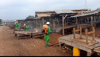 Disinfection exercise being carried out in a market