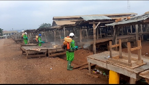 Disinfection exercise being carried out in a market