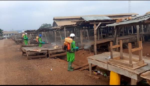 Disinfection exercise being carried out in a market