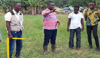 Amenfi Central DCE, Patrick Hodson Amponteng talking to some of the workers