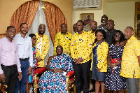 Otumfuo Osei-Tutu II in a group photo with some staff of MTN Ghana