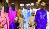 Some of the brides standing with their families