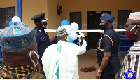 The Bolgatanga MCE and DCOP Ampofo-Duku cutting the tape for the inauguration