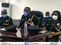 The three national officers who led the visit at a meeting with some officers