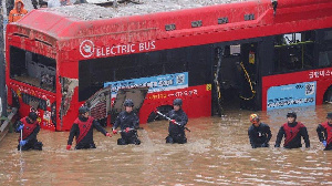 Photo of flood waters wit responders