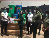 ma Regional Commander of the Ghana Immigration Service ACI Adwoa Sika Anim  receiving items