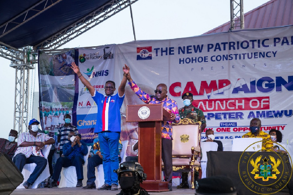 President Akufo-Addo lifting the hand of the NPP Candidate for Hohoe, John Peter Amewu