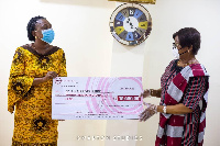 NUHOPSA presenting the cheque to Sophia Akufo