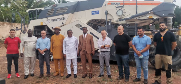 George Mireku Duker in a group photo with the contractors and other officials