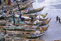 Fisherfolk attend to their boats | File photo