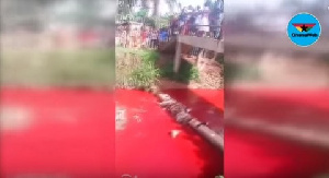 A tie-and-dye powder was poured into the river