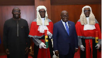 Akufo-Addo and Bawumia with the new justices after the ceremony