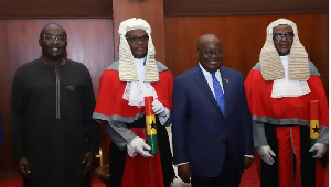 Akufo-Addo and Bawumia with the new justices after the ceremony