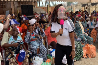 Nana Ama McBrown speaking at the brief event at Konkomba Market in Accra