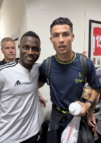 Mudasiru Salifu (left) with  Cristiano Ronaldo (right)