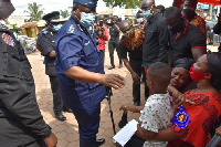 The IGP visited the family of the slain officer in the James Town robbery on Tuesday