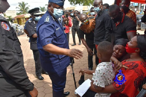 The IGP visited the family of the slain officer in the James Town robbery on Tuesday