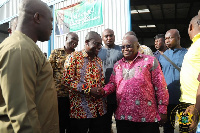 Akufo-Addo (left) in a handshake with the Chairman of the Jospong Group, Joseph Siaw Agyepong