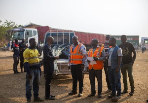 The items donated included roofing sheets, iron rods, cement, and other consumables