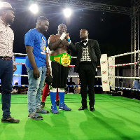 One of Samed's boxers, Osumanu Haruna with the title