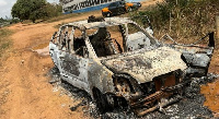 A Kia Picanto was burnt by the students during the clash